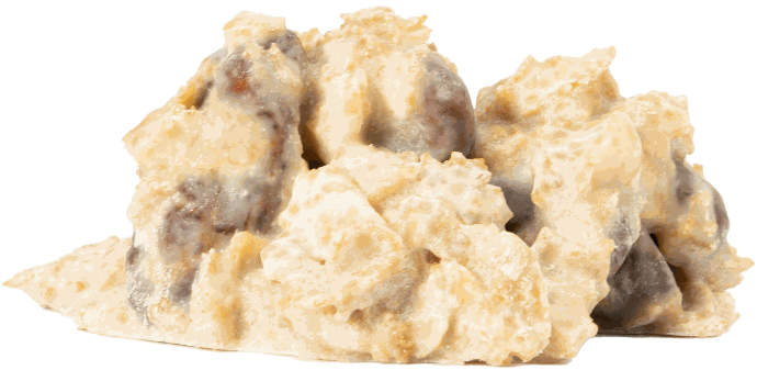 Roca choco blanco Almendra caramelizada, nuez pecana y barquillo